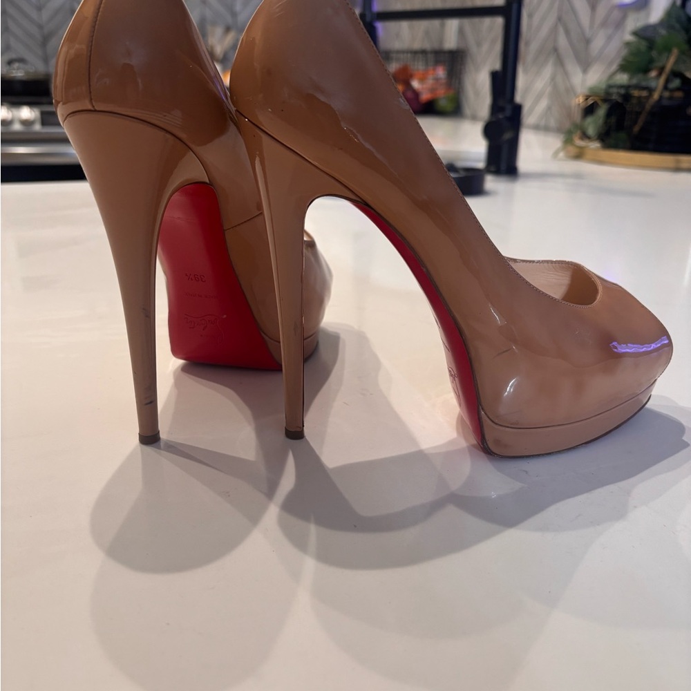 Christian Louboutin Nude and Red Heels